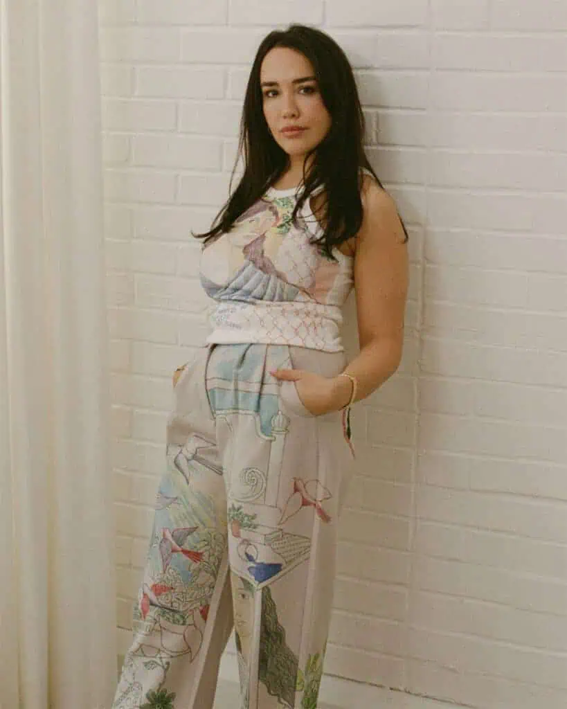 Artist Amrit Singh wearing her custom wearable artwork inspired by Clarice Lispector’s “The Hour of the Star”, created for curator Gigi Surel and Teaspoon Projects.