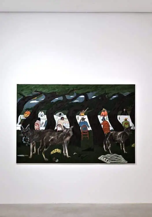 Large Jack Penny painting of wolves and masked figures among leaning trees from ‘Kitchen of Earthly Delights’ exhibition.