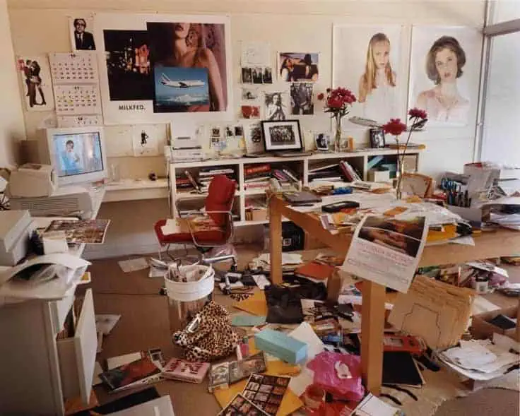 Photograph of Sofia Coppola’s home office filled with books, papers, photos, and creative materials reflecting her cinematic and fashion influences.