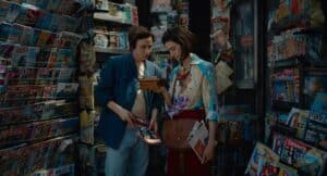 A newsstand scene from “Paul and Paulette Take a Bath,” with Paul and Paulette looking through magazines.