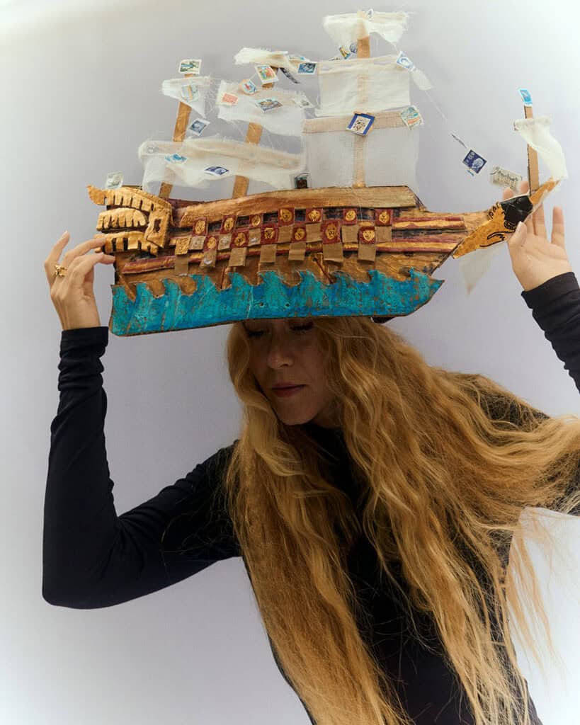 nna von Hausswolff wearing a black dress and a ship-shaped headpiece, black-and-white artistic portrait by Fredrik Bengtsson for Cold Magazine cover feature on “ICONOCLASTS”.