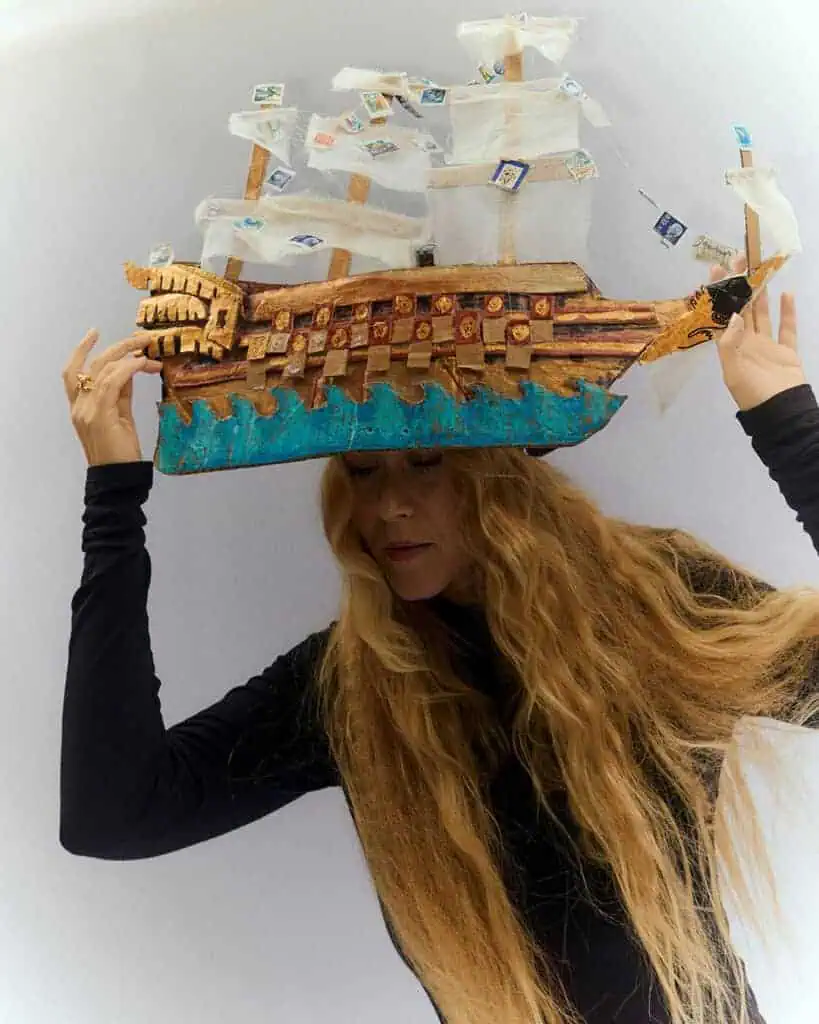nna von Hausswolff wearing a black dress and a ship-shaped headpiece, black-and-white artistic portrait by Fredrik Bengtsson for Cold Magazine cover feature on “ICONOCLASTS”.