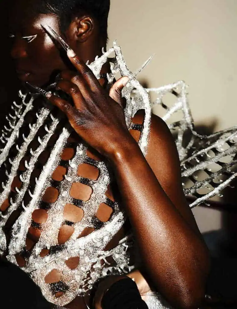 Close-up of sculptural lattice bodice from Karina Bond SS26 emphasizing hand-crafted structural textile design.