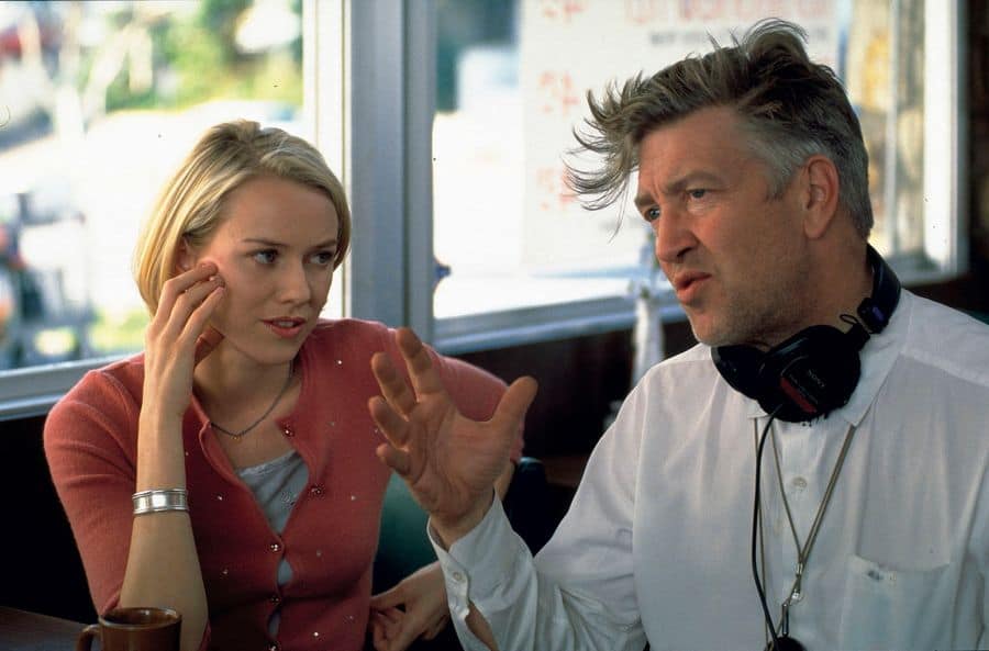 David Lynch directing an actress on set, illustrating his collaborative creative process.