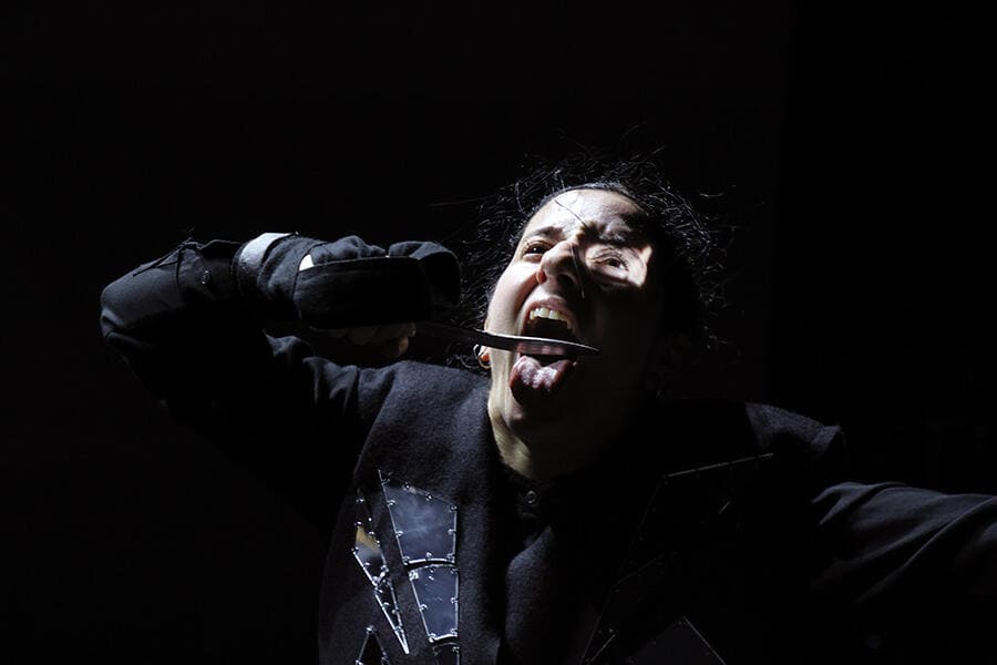 Expressive solo performer in Marina Abramović’s Balkan Erotic Epic, captured mid-cry in an intense moment of release.