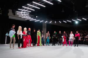 Matil Vanlint’s graduate collection showcased on the runway, featuring sculptural silhouettes and surreal wigs