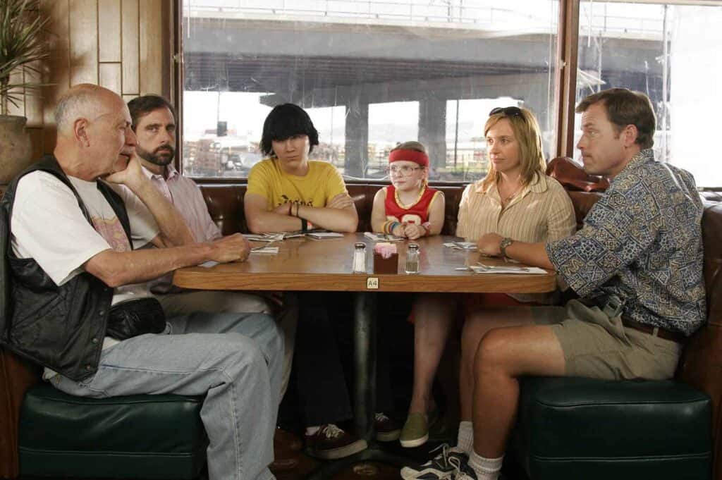 Family sitting around a diner booth waiting for waffles à la mode in a scene from “Little Miss Sunshine” (2006).