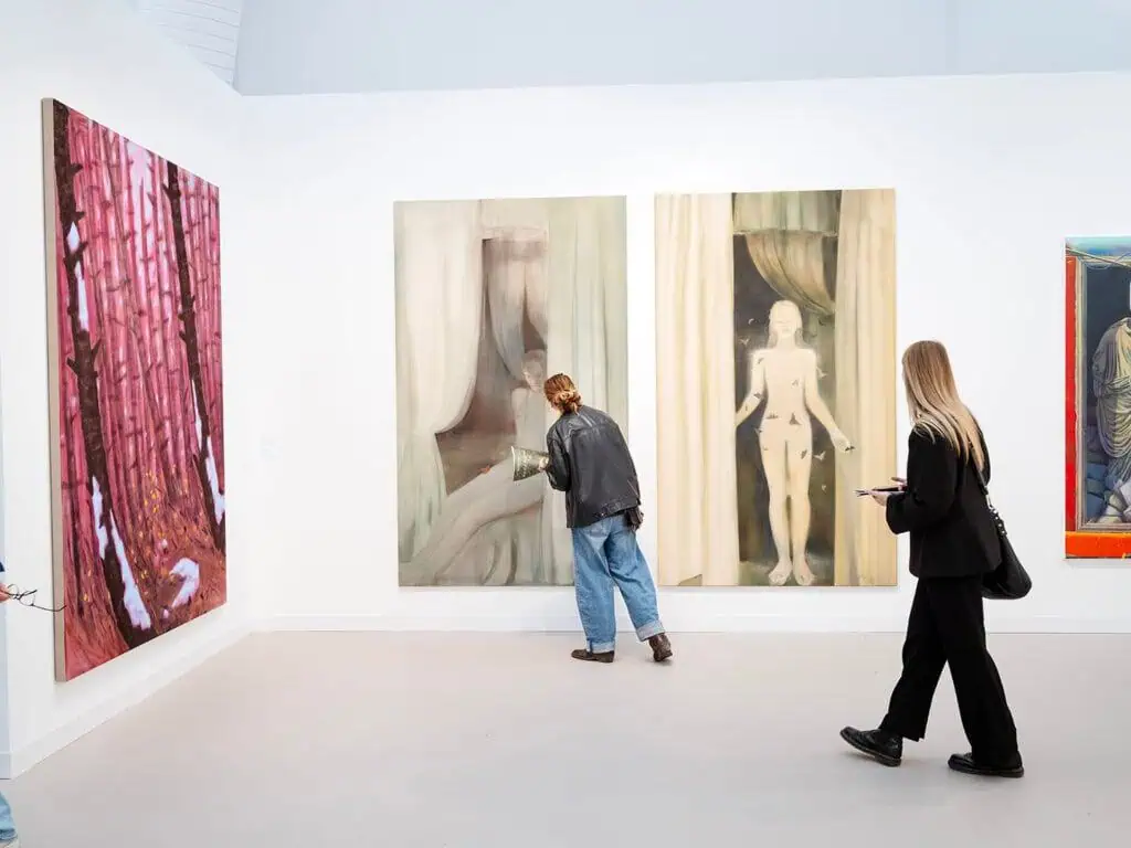 Installation view of Anna Ruth’s paintings Final Form (2024) and Final Form II (2025) at Grimm Gallery during Frieze London 2025, featuring ghostly figures, cascading curtains, and surreal, dreamlike imagery.