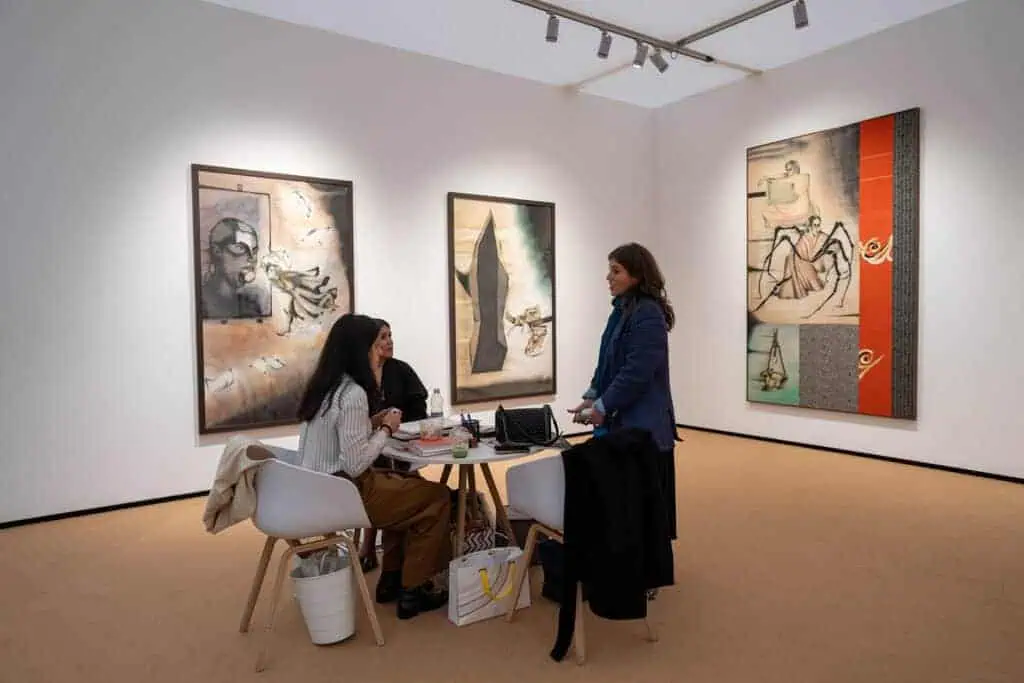Visitors at Vadehra Art Gallery during Frieze Masters 2025 view Anju Dodiya’s mixed-media works from Ancestral Log, blending charcoal, pastel, and fabric to explore the spiritual and everyday.