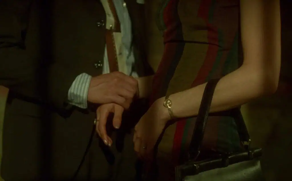 Hands gently touching in a symbolic moment of longing from “In the Mood for Love.”
