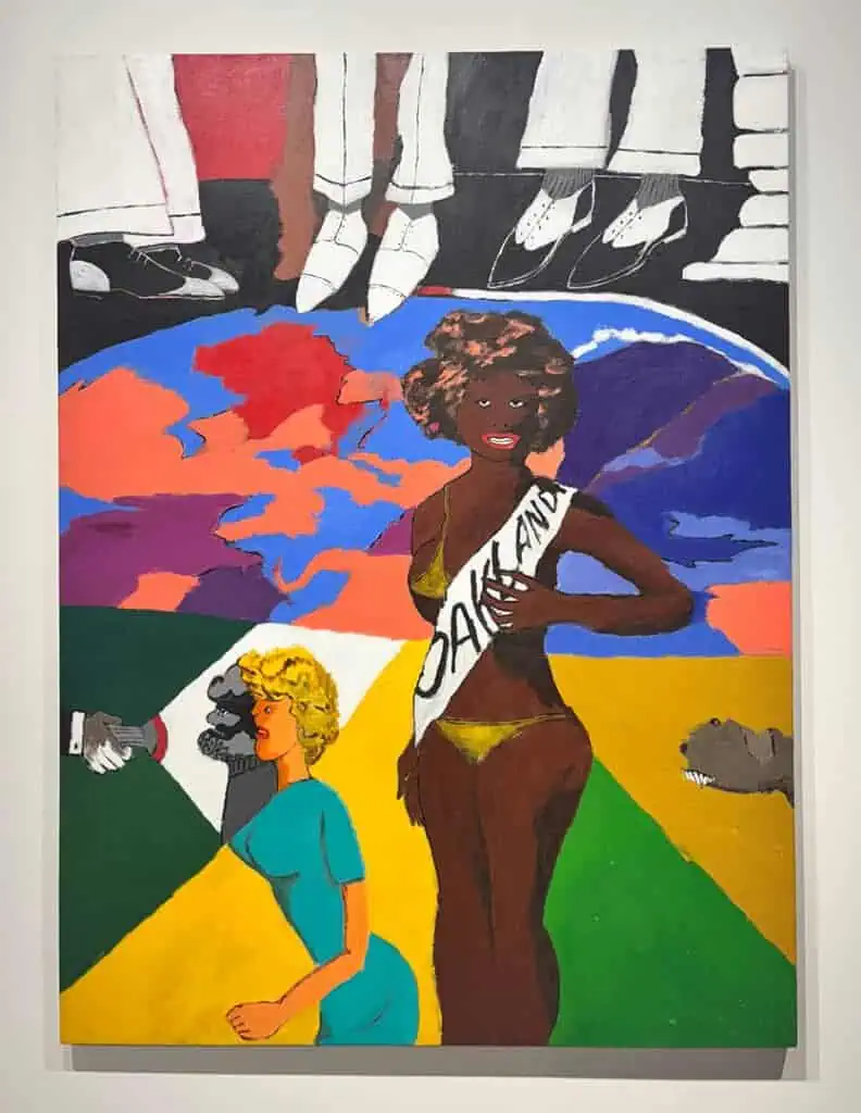 A colorful painting, featured at Miami Art Week 2025, shows a Black woman in a bikini and an "Oakland" sash standing confidently. Behind her: a dramatic sky, a kneeling blonde woman, shaking hands in suits, and animal heads in the corners.