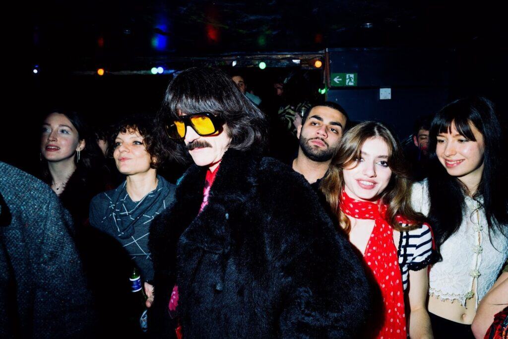 A group of people in a room.