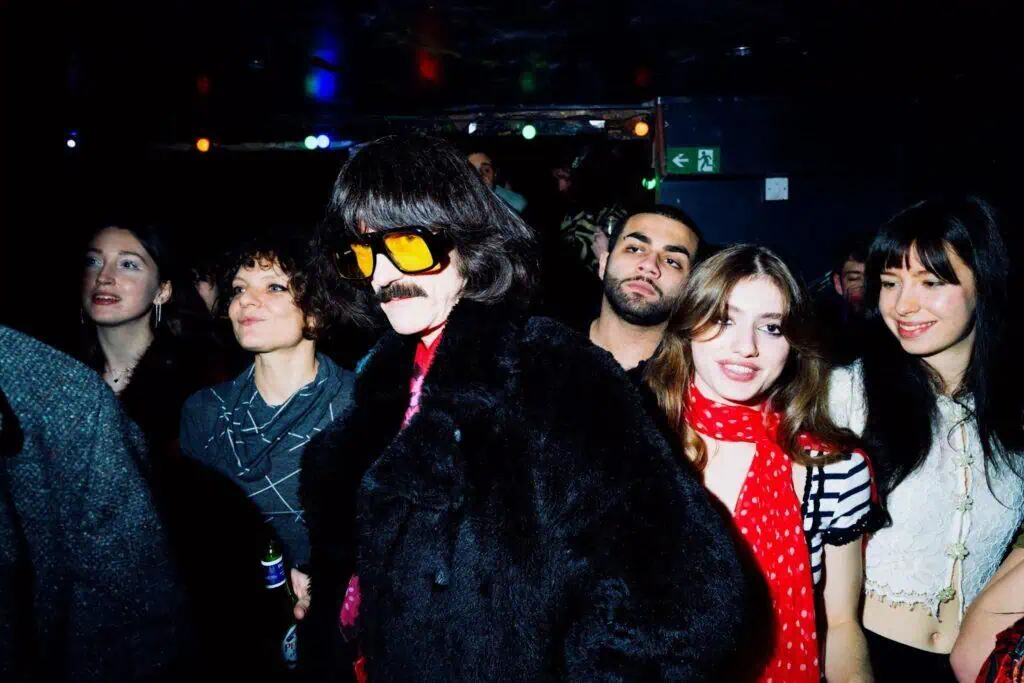 A group of people in a room.