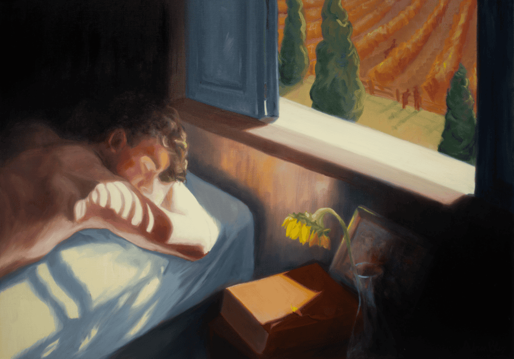 A shirtless person sleeps on a bed in sunlight near an open window. Outside, sunlit fields and trees are visible. A wilted sunflower, a framed photo, and a closed book sit on the windowsill, bathed in warm light.