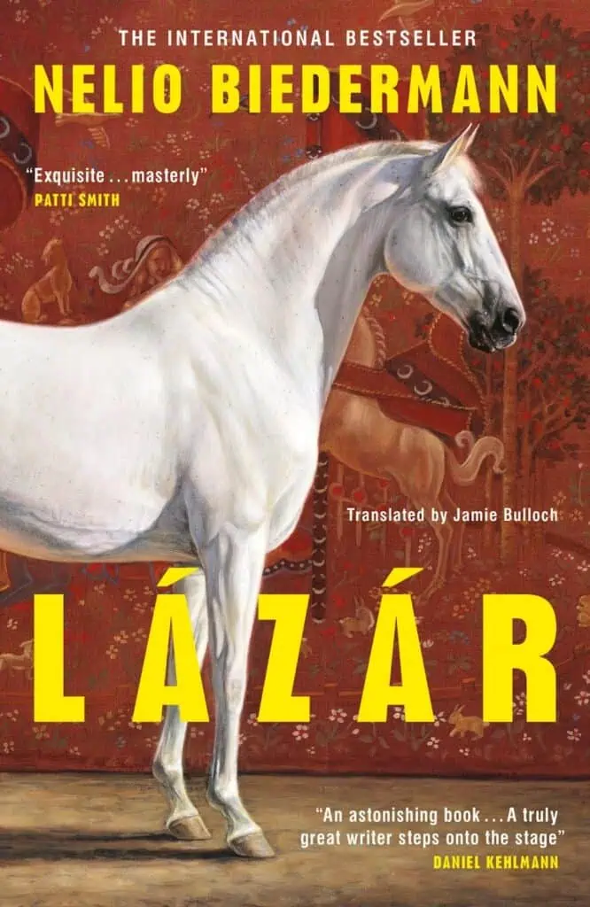 The book cover of the international bestseller Lázár by Nelio Biedermann, featuring a prominent illustration of a white horse against a red patterned tapestry background.