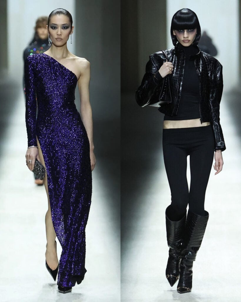A split image shows two models on a runway: the left wears a shimmering one-shoulder purple sequin gown with a thigh-high slit, and the right wears a black cropped jacket, black top, leggings, and knee-high black boots.