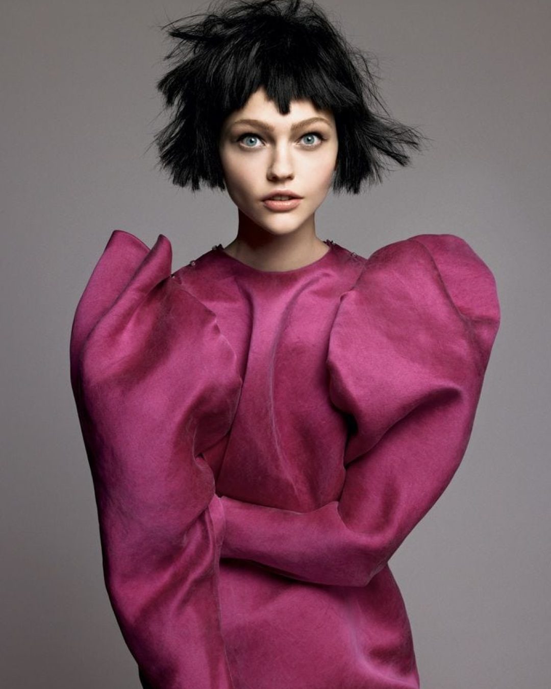 Lanvin editorial look featuring a sculptural pink dress inspired by Alber Elbaz’s signature silhouettes.