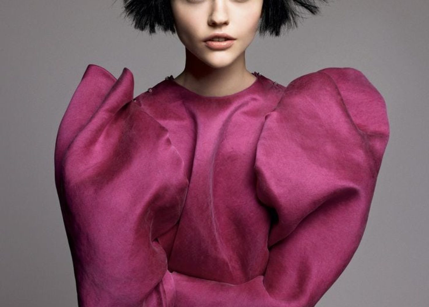 Lanvin editorial look featuring a sculptural pink dress inspired by Alber Elbaz’s signature silhouettes.