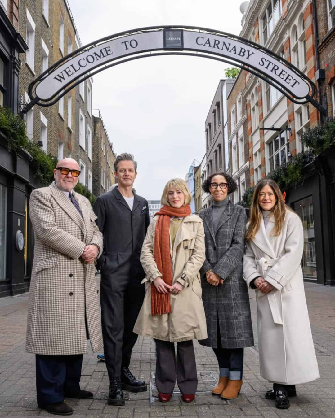 Shaftesbury Capital have partnered with London College of Fashion (LCF) to run a competition for 2 members of their alumni to win studio space on Kingly Street. Pic Shows Tilda Jonathan on Carnaby Street with judges Catherine Riccomini (Director of Marketing & Communications, Shaftesbury Capital), Mark Powell (Bespoke Tailor), Daniel Poulson (Course Leader BA (Hons) Bespoke Tailoring, LCF) and Frances Odell (Head of Graduate Futures Consultant, LCF)